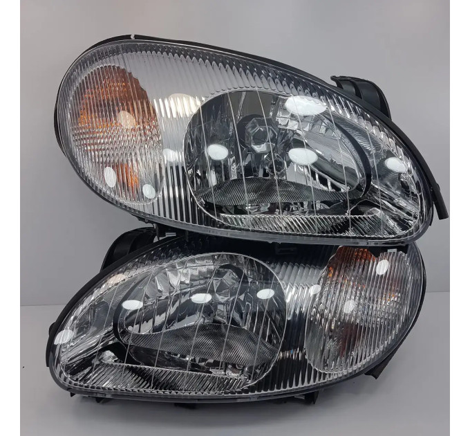 Фара DAEWOO LANOS ліва чорний корпус 96304610